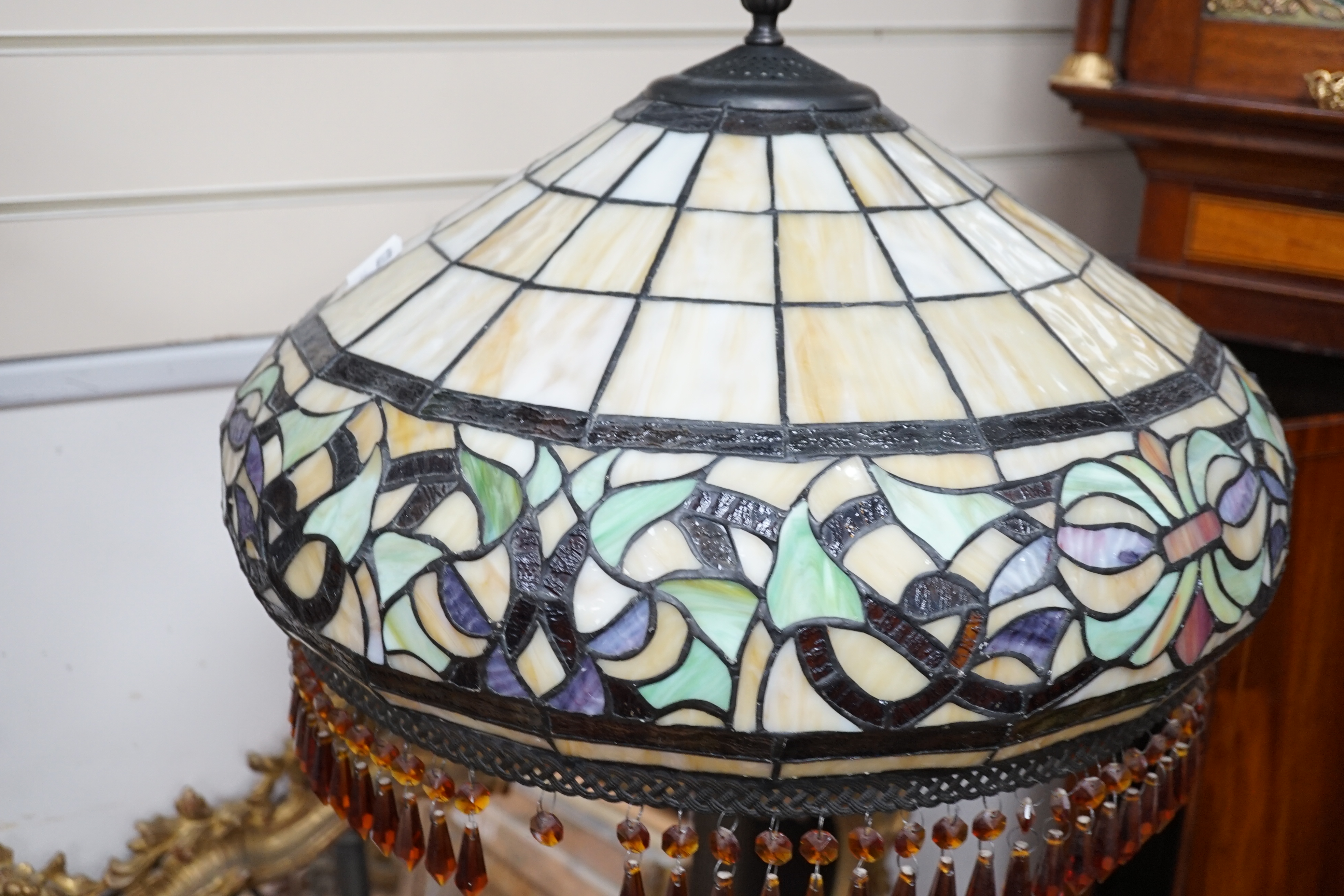 A Tiffany style leaded glass and bronzed metal lamp standard, height 164cm